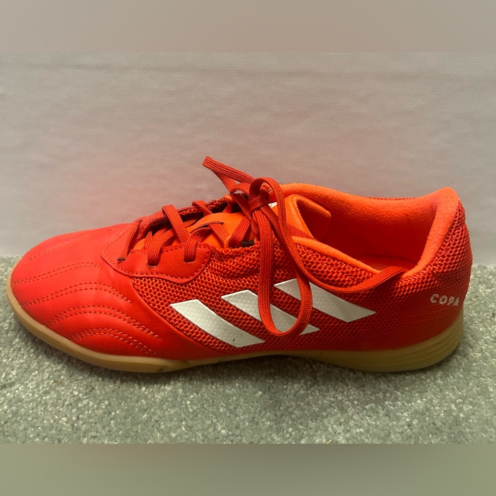 Adidas Copa Sense.3 Indoor Sala soccer shoes in red with white stripes.